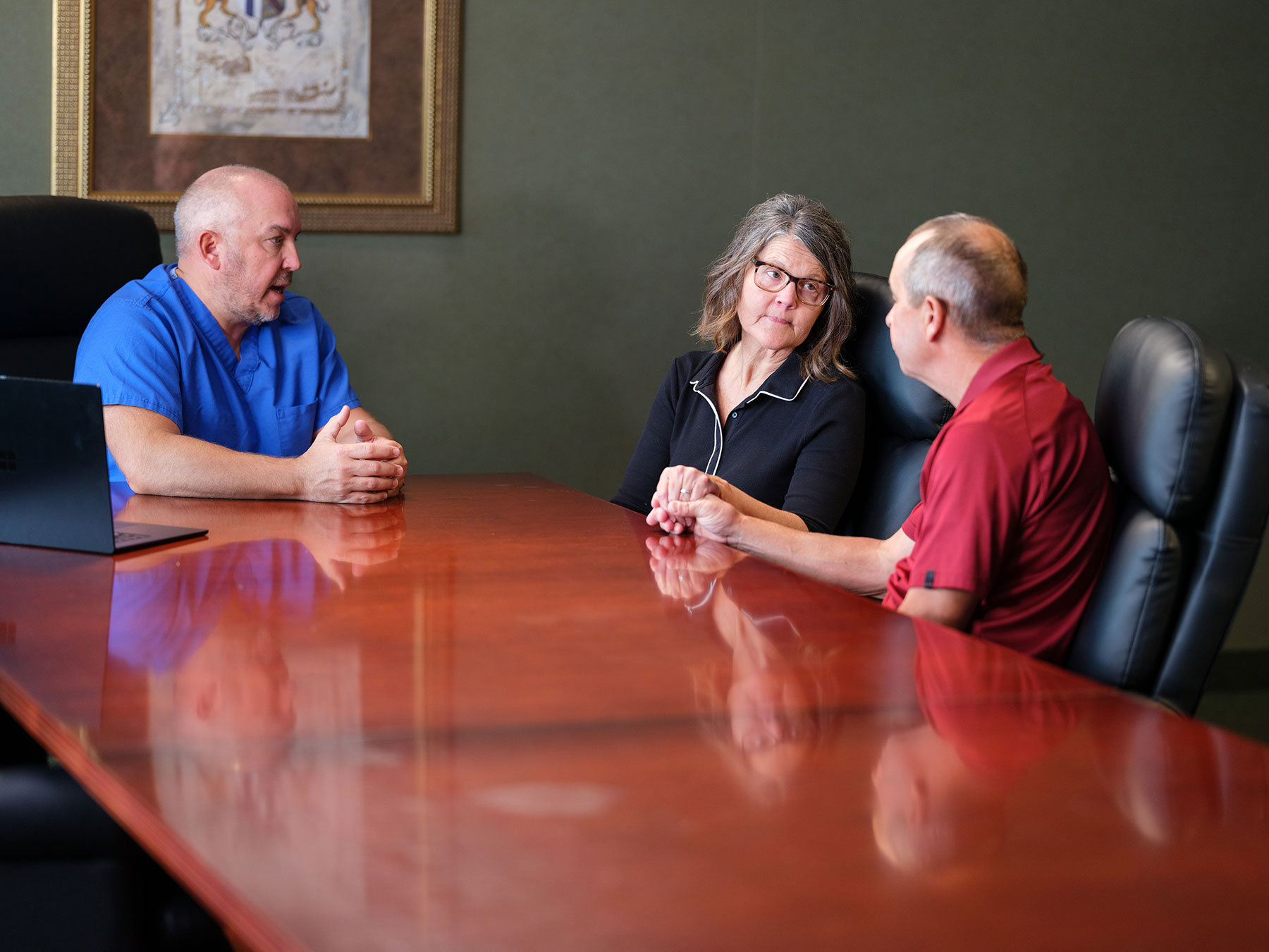 Fran Swartzentruber and her husband, Norman, talk with Dr. Kurucz
