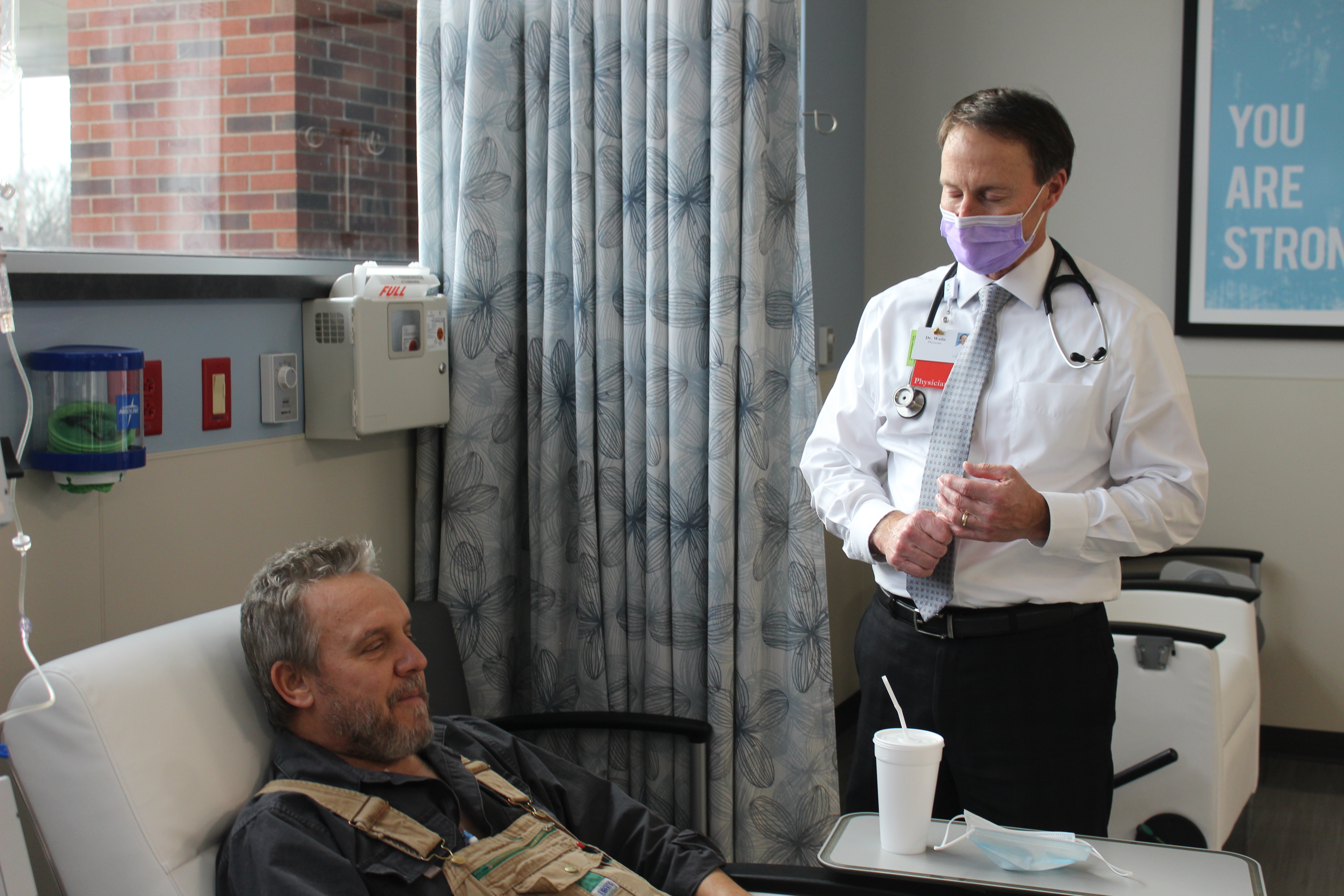 Dr Waits with patient